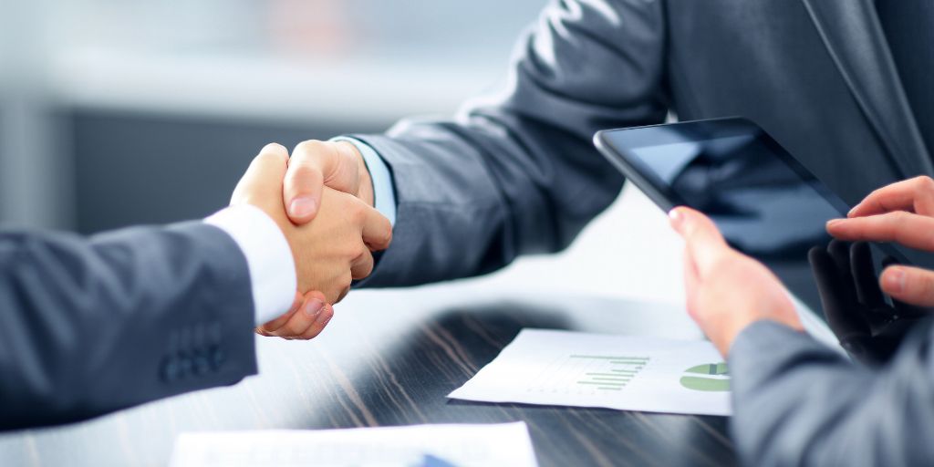 Dubai law treats any ownership change between companies as a transfer