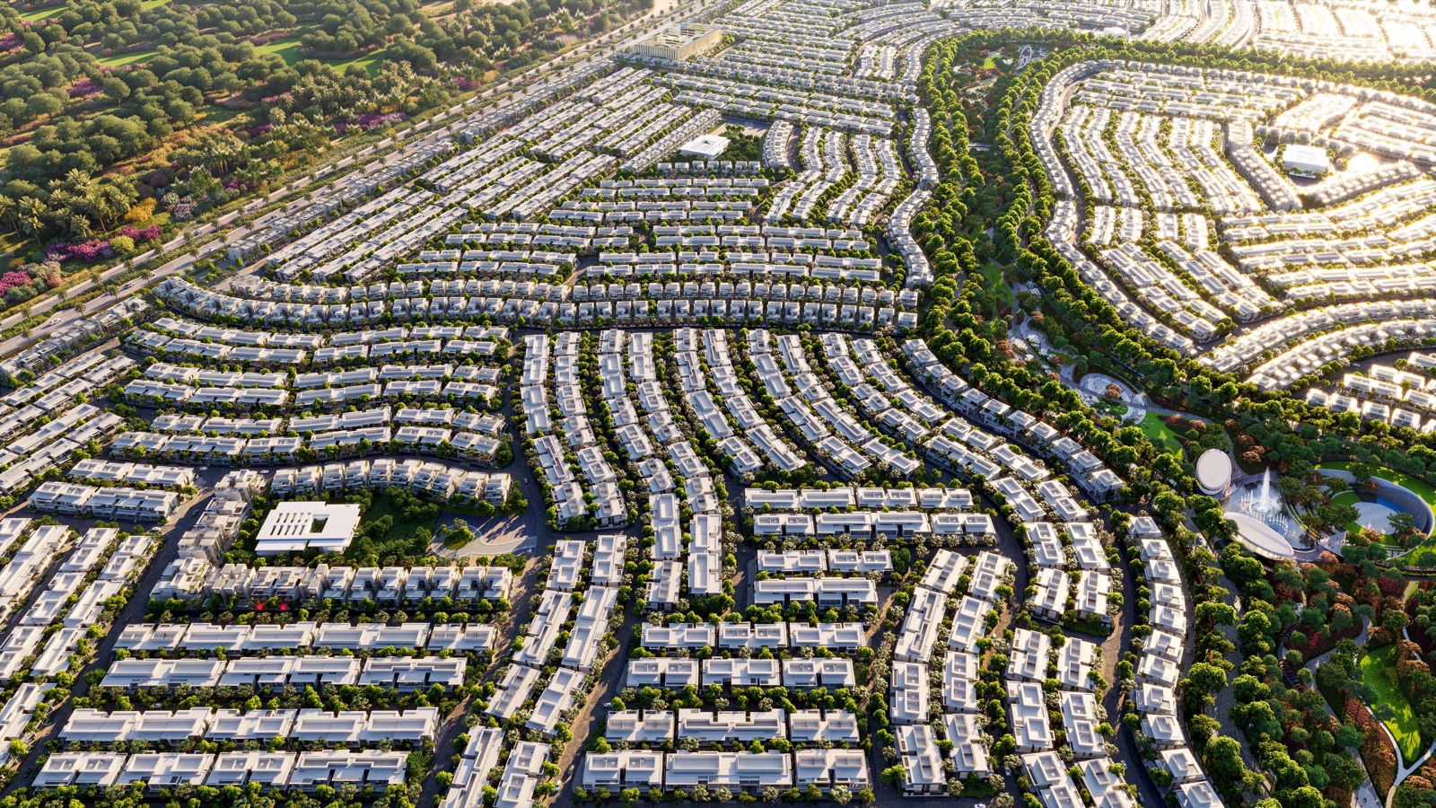 Aerial view over the townhouse and villa clusters at Azizi Florence, showing the curved street pattern and green spine between them